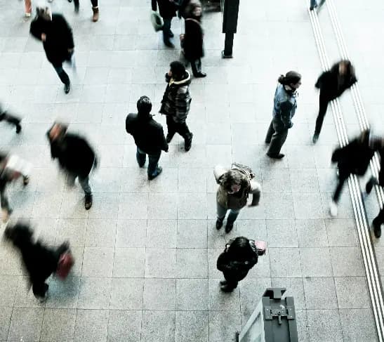 People walking through a public space
